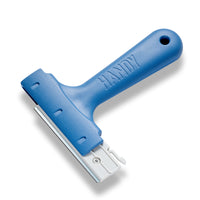 Détail lame carbone du grattoir vitres Triumph Handy pour enlèvement taches et adhésifs